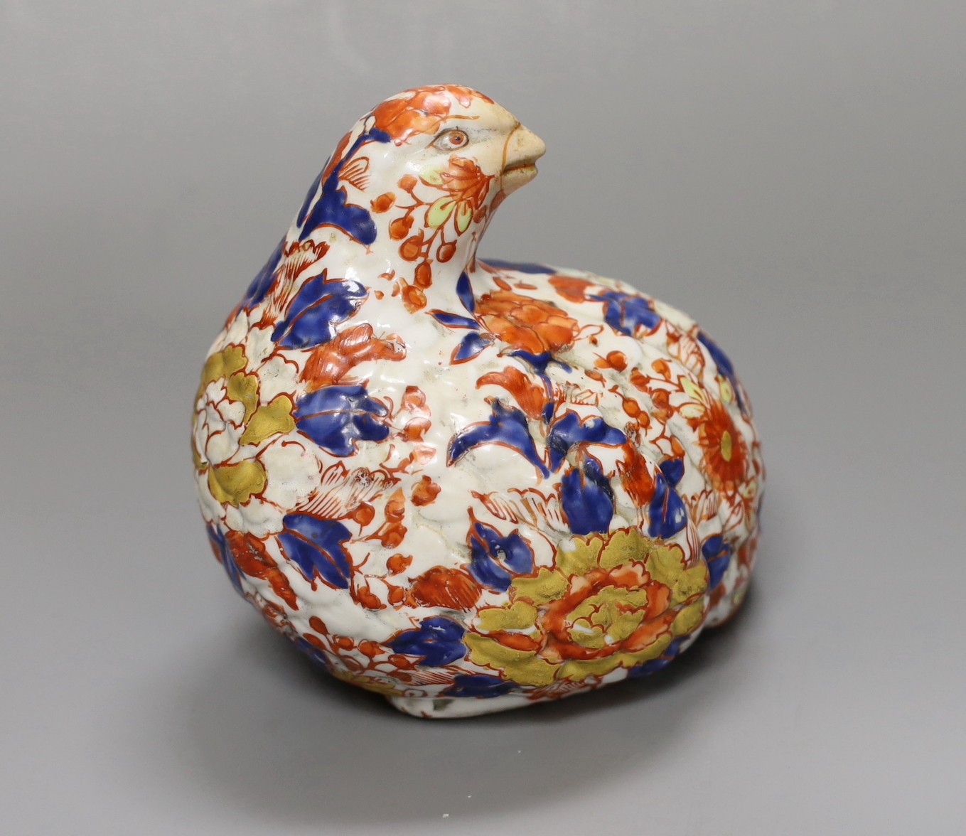 An Imari figure of a quail, signed to base. 14cm tall